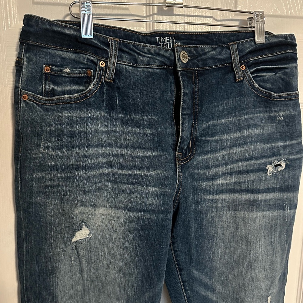 14 mid rise time and tru distressed jeans